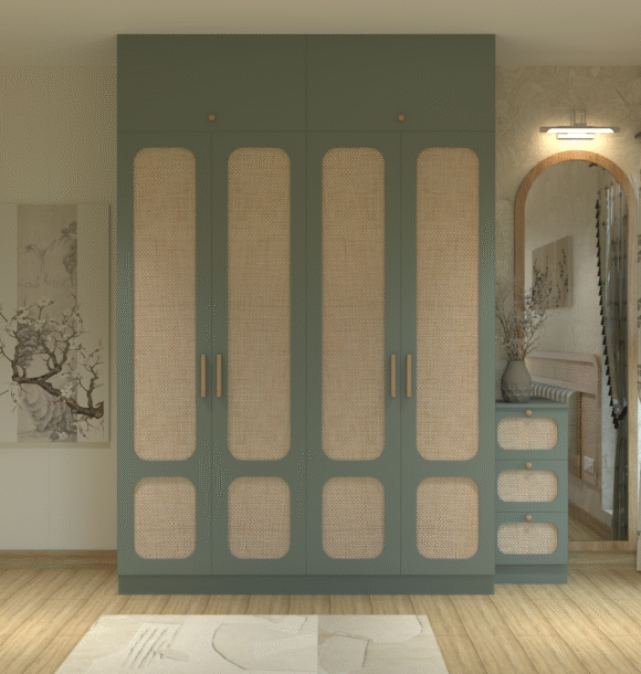 Boho-inspired bedroom with sage green wardrobe, rounded cane panel shutters, wooden handles, integrated dressing table, arched mirror, botanical wallpaper, wooden bed, and soft neutral decor.