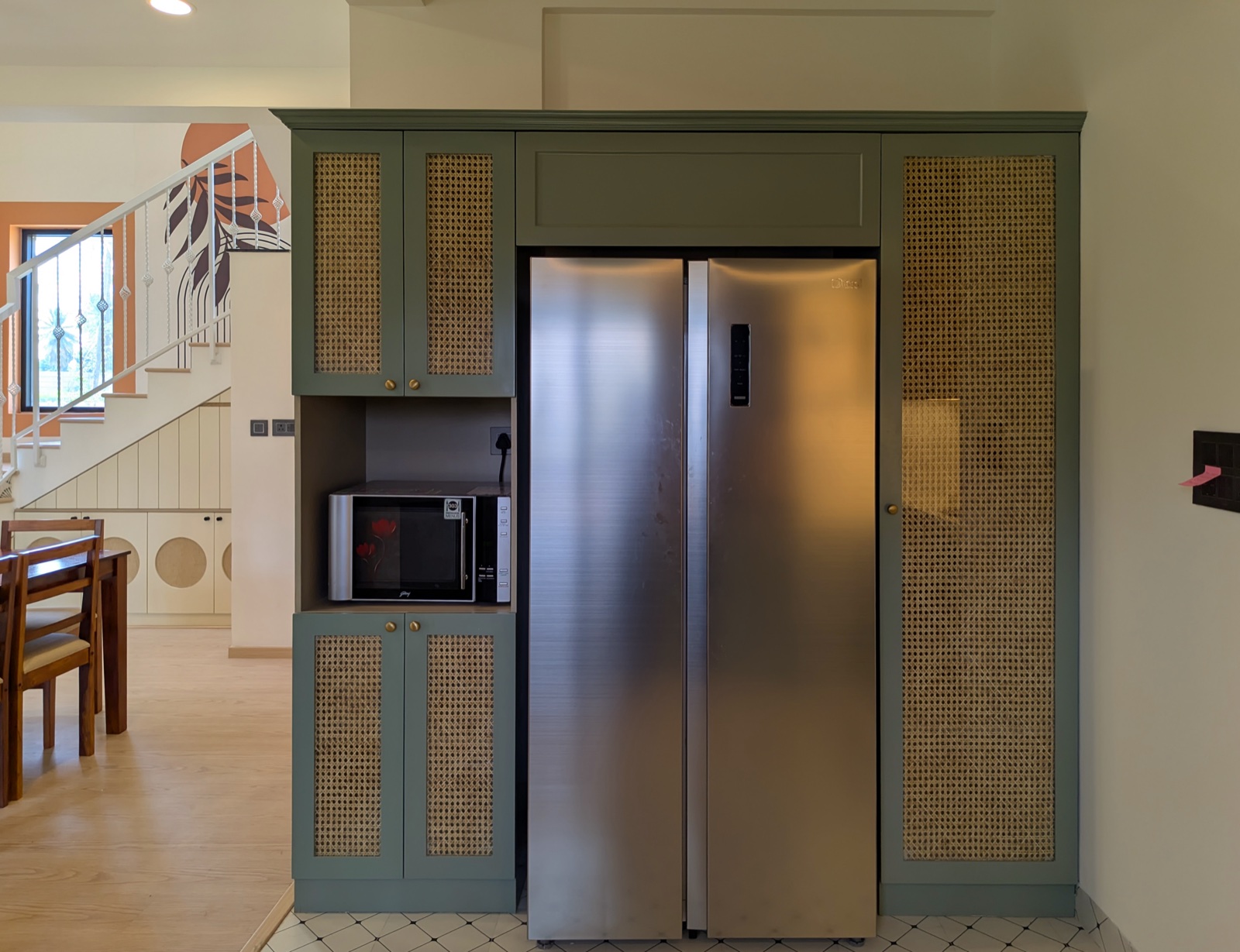Completed interior: Refrigerator and tall storage