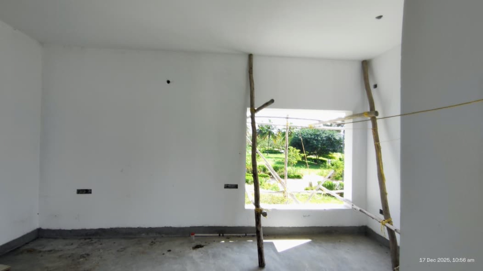Before interiors: Primary-bedroom bed wall