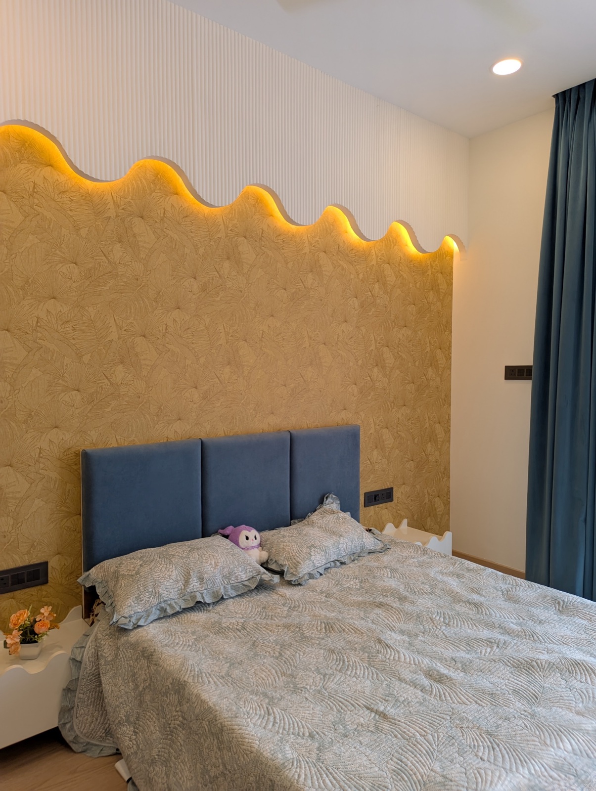 Completed interior: Blue-and-ochre bedroom