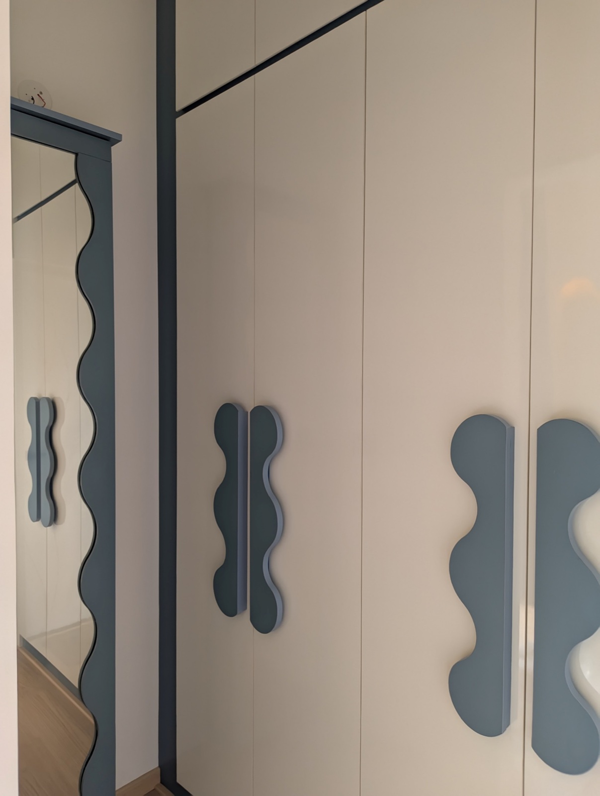 Completed interior: Blue bedroom wardrobe