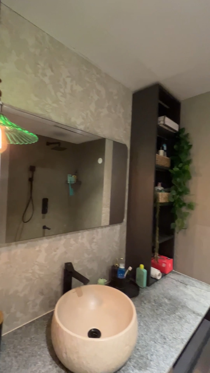 Finished bathroom vanity, mirror and storage after renovation